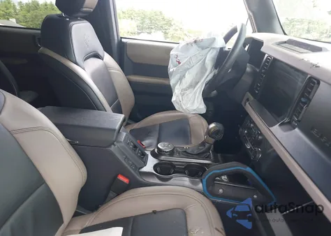 2023 Ford Bronco Wildtrak z USA, uszkodzony, nr VIN 1FMEE5DP9PLB43528